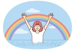 Happy girl rejoices at rainbow appeared in sky after rain, and runs across field with tall grass vector