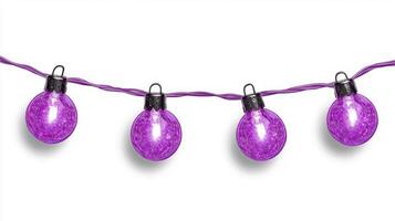 Purple light bulbs hanging from a string photo