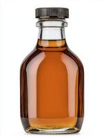 A bottle of maple syrup on a white background photo