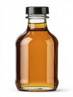 A bottle of maple syrup on a white background photo