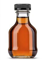 A bottle of maple syrup isolated on a white background photo