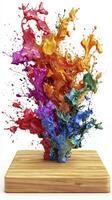 Colorful paint splashes on a wooden block photo