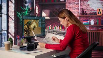 Remote worker in creative office uses CAD software and blueprints plan, design a house interior and provides a user interface for virtual home customization. Detailed architectural layout. Camera B. video