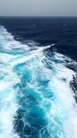 A view of the ocean from the deck of a ship photo