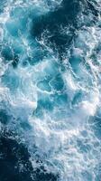 A view of the ocean from above with waves photo