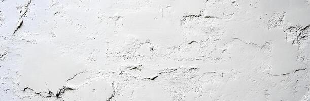 A white wall with paint peeling off of it photo
