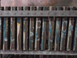Row of ornamental tiles on shelf photo