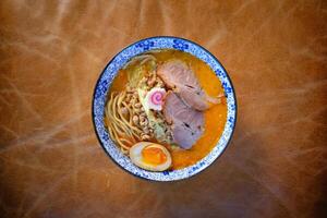 Appetizing Asian soup with noodles and meat photo