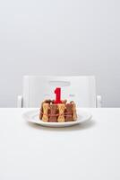 Delicious cake with candle on table photo