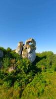 FPV flight through a hole in the limestone rock in Jurassic highlands, Poland video