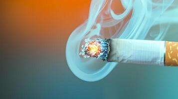 Lit cigarette burning and generating smoke on gradient background photo