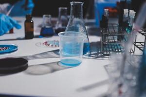 A person in a lab coat is working on a project photo