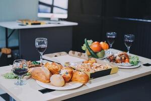 A table with food and wine on it photo