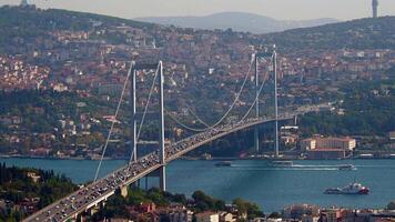 Traffic flows across the beautiful bridge in Istanbul video