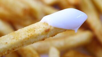 Enjoying crispy fries with creamy dip at a local eatery video