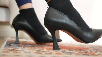 High heels showcase with socks on a colorful carpet video