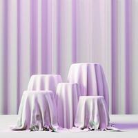Five cylindrical platforms are draped with pink fabric, with a matching fabric background featuring vertical stripes. The scene is softly lit and has a gentle, elegant feel. photo