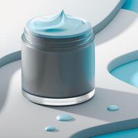 A jar of light-blue cream is centered on a beige platform with a geometric cutout pattern. Several small drops of cream are on the platform. The scene is set against a pale blue and white background. photo