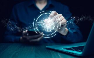 Artificial intelligence and data analysis concept. Businessman using AI-powered technology to process big data, generate insights, Futuristic digital transformation in finance and business. photo