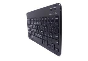 A black keyboard is shown on a white background photo
