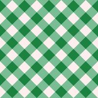 Green and white gingham pattern. Seamless background. vector