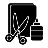 A trendy solid design icon of scissors with glue vector