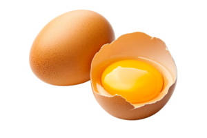 Fresh brown egg with cracked shell and yolk on transparent background png