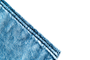 Close up of denim fabric with visible stitching and texture details png