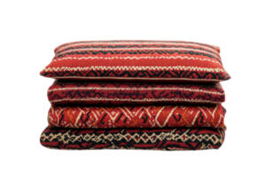 Decorative cushions with intricate patterns stacked together png