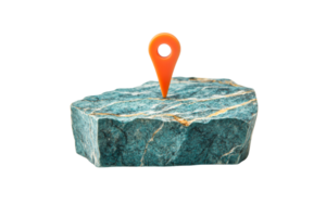 Orange location pin stuck in rough, turquoise stone block, cut out transparent png