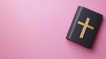 Dark Purple Book With Golden Cross On Pink Backgrounds of Book Cover photo