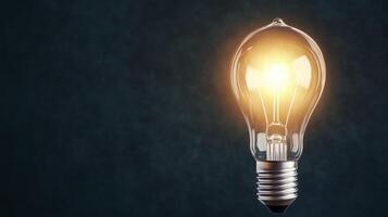 Glowing Lightbulb On Dark Background A Symbol Of Inspiration photo