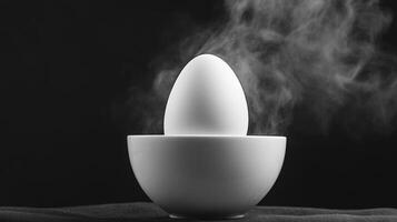 Steaming Egg In White Bowl On Dark Backgrounds Aesthetics and Simple photo