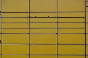 Close-up of Yellow Metal Surface with Rust photo