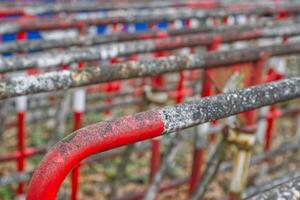 Weathered Red and White Metal Railings photo
