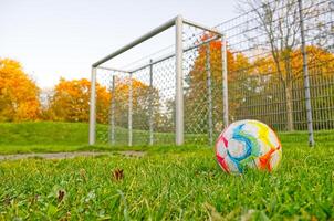 Colorful Soccer Ball in Autumn Setting photo