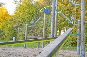 Playground with Seesaw and Climbing Structure photo