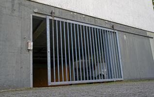 Open Metal Gate at Parking Garage Entrance photo