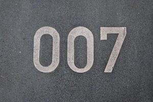 Mysterious Number 007 on Gray Surface photo