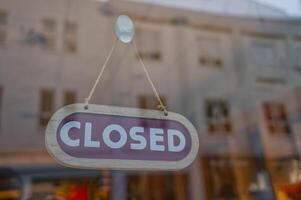 Closed Sign in Shop Window photo