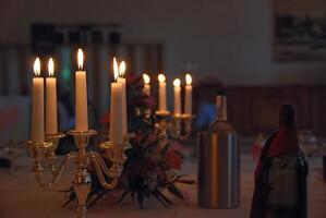 Elegant Dining Table with Candles and Wine photo