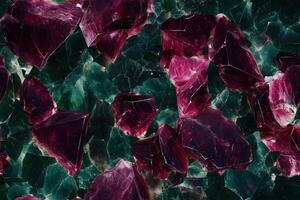A close up of a bunch of red and green crystals photo