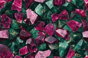 A large pile of pink and green stones photo