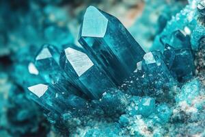 Blue crystals on a rock with some light photo