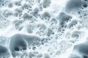 A close up of a white snow covered surface photo