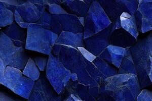 A blue stone wall with many pieces of blue stone photo