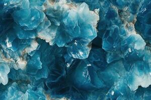 Blue crystals on a rock wall photo