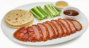 A plate with sliced meat and bread on it photo