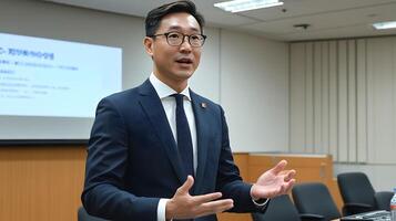 Energetic lecture by professional trainer addressing employees, emphasizing strategic growth and learning photo