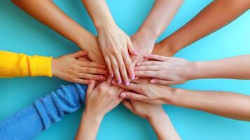 Corporate group celebrating teamwork diverse hands in a stack representing collaboration and inclusivity photo